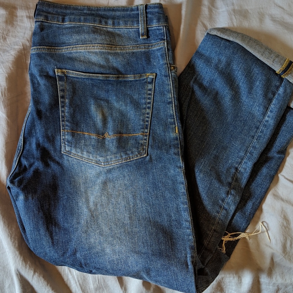 Medium-wash ASOS ripped jeans